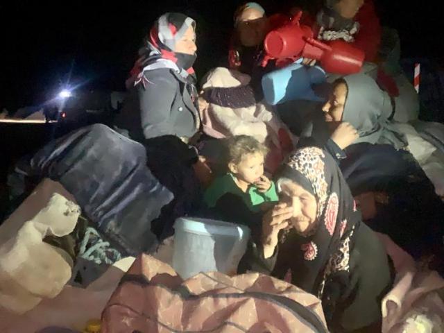 Syrian refugees in the middle of the fighting. (Image credit: Dave Eubank, Free Burma Rangers)