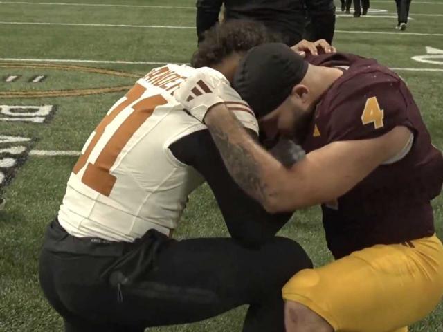 Texas freshman RB Nick Sanders and ASU star RB Cam Skattebo kneeling in prayer.