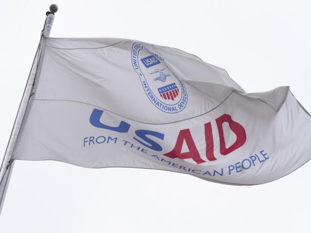 The flag of the United States Agency for International Development, or USAID, flies in front of the USAID office in Washington, Monday, Feb. 3, 2025. (AP Photo/Manuel Balce Ceneta)