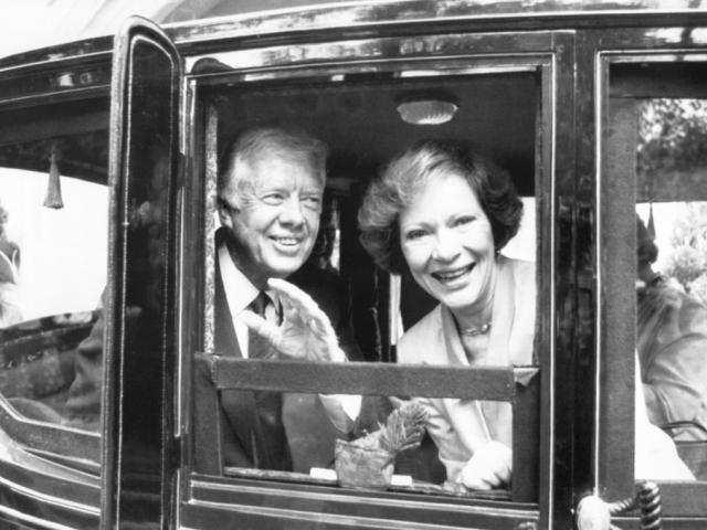 File photo dated 04/07/87 of former US President Jimmy Carter and his wife Rosalyn travelling by carriage in the Newcastle Lord Mayor&#039;s parade. (Press Association via AP Images)