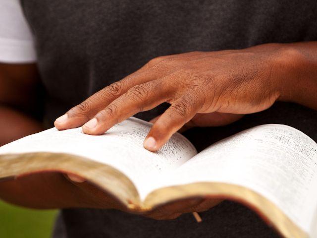 hand on bible