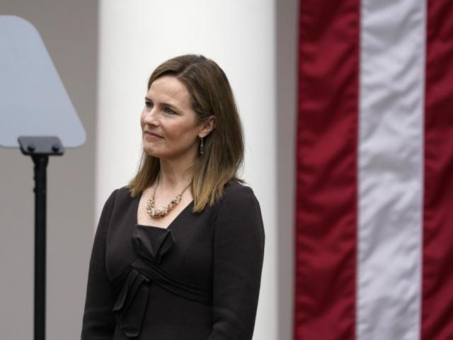 Judge Amy Coney Barrett listens as President Trump announces Barrett as his nominee to the Supreme Court (AP Photo/Alex Brandon)