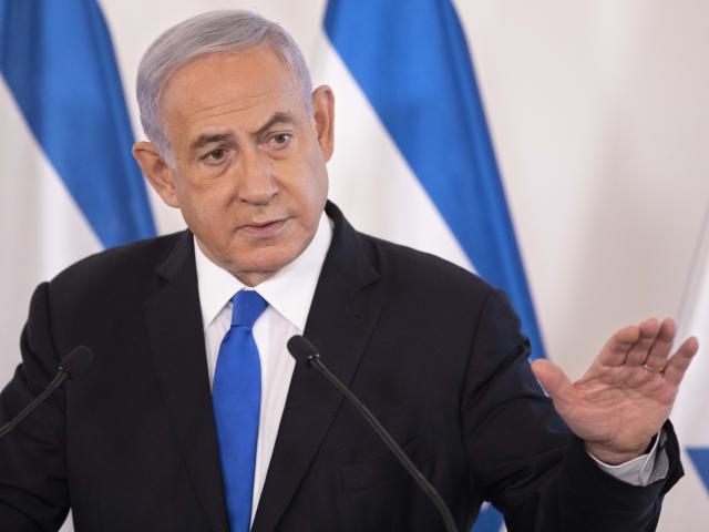 Former Israeli Prime Minister Benjamin Netanyahu gestures as he speaks during a briefing to ambassadors to Israel at the Hakirya military base in Tel Aviv, Israel, Wednesday, May 19, 2021. (AP Photo/Sebastian Scheiner, Pool)