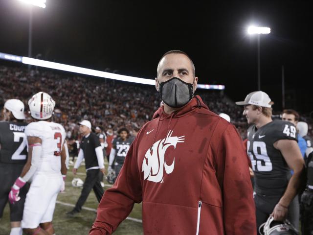 Washington State coach Nick Rolovich walks on the field after the team&#039;s NCAA college football game against Stanford, Saturday, Oct. 16, 2021, in Pullman, Wash. Washington State won 34-31. (AP Photo/Young Kwak)