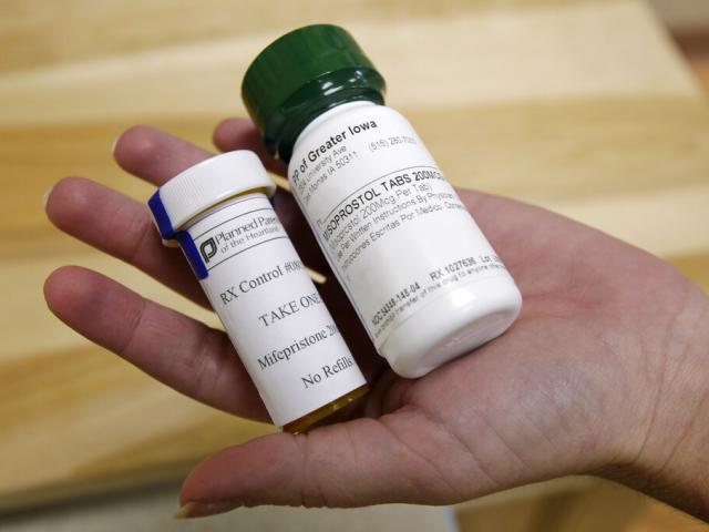 This Sept. 22, 2010 file photo shows bottles of abortion pills at a clinic in Des Moines, Iowa. (AP Photo/Charlie Neibergall, file)