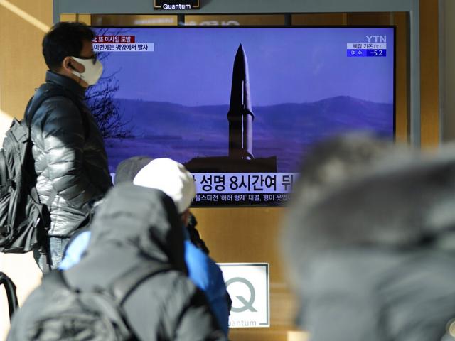 People watch a TV screen showing a news program reporting about North Korea&#039;s missile launch with a file image, at a train station in Seoul, South Korea, Monday, Jan. 17, 2022. (AP Photo/Lee Jin-man)