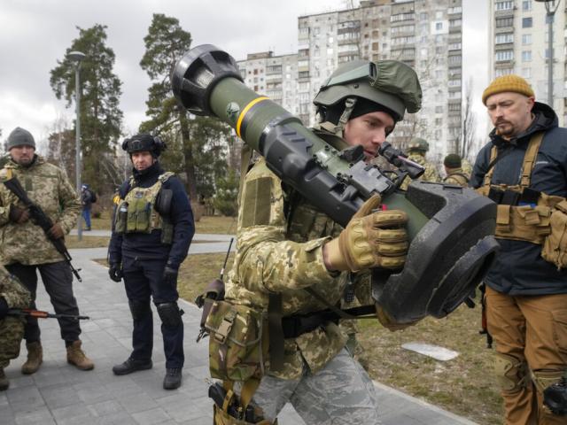 A Ukrainian Territorial Defence Forces member holds an NLAW anti-tank weapon, in the outskirts of Kyiv, Ukraine, on March 9, 2022. (AP Photo/Efrem Lukatsky)