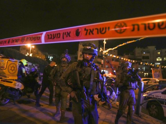 Israeli forces secure the area of a stabbing attack in the town of Elad, Israel, Thursday, May 5, 2022. (AP Photo)