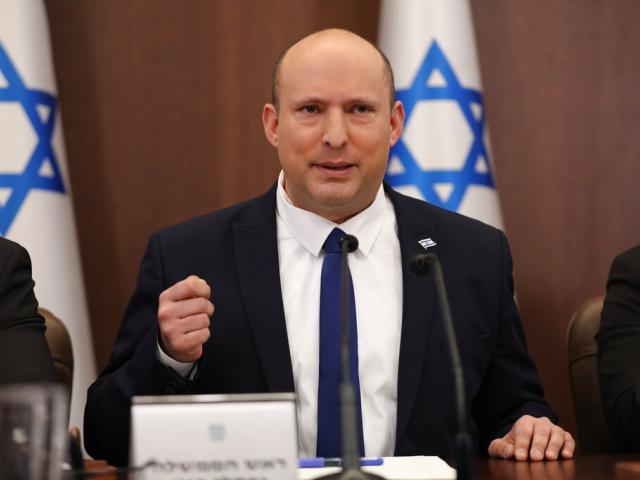 Israeli Prime Minister Naftali Bennett, center, attends a cabinet meeting at the prime minister&#039;s office in Jerusalem, Sunday, May 15, 2022. (Abir Sultan/Pool Photo via AP)