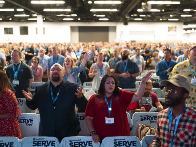 Attendees sing during a worship service at the Southern Baptist Convention’s annual meeting in Anaheim, Calif., Tuesday, June 14, 2022. (AP Photo/Jae C. Hong)