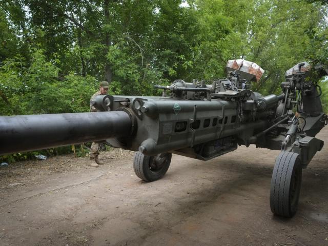 Ukrainian soldiers move a U.S.-supplied M777 howitzer into position to fire at Russian positions in Ukraine&#039;s eastern Donetsk region June 18, 2022. U.S. officials will send another $450 million in military aid to Ukraine. (AP Photo/Efrem Lukatsky, File)