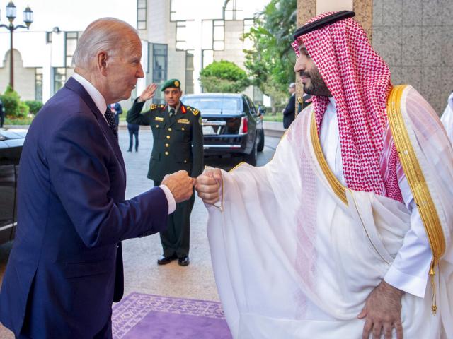 In this image released by the Saudi Royal Palace, Saudi Crown Prince Mohammed bin Salman, right, greets President Joe Biden with a fist bump. (Bandar Aljaloud/Saudi Royal Palace via AP)