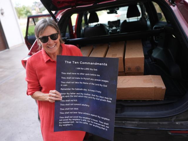 Debbie Leimbach displays one of the hundreds of Ten Commandments posters she was preparing to deliver to local public schools in New Braunfels, Texas, Nov. 17, 2025. (AP Photo/Eric Gay) Debbie Leimbach displays one of the hundreds of Ten Commandments posters she was preparing to deliver to local public schools in New Braunfels, Texas, Nov. 17, 2025. (AP Photo/Eric Gay)