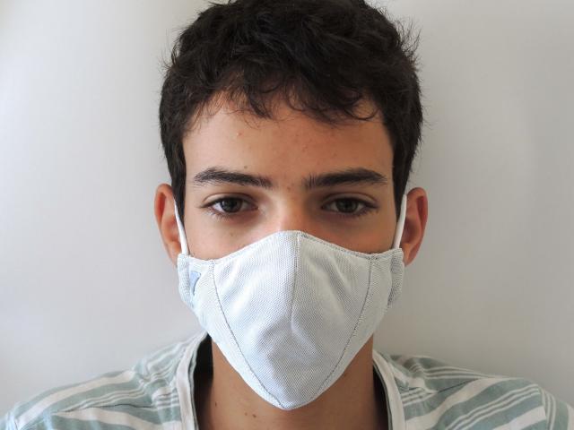 A man wearing a prototype of Argaman Technologies&#039; antiviral face masks developed in Jerusalem