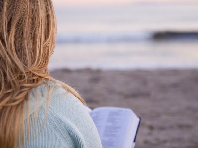 Bible being read at the beach