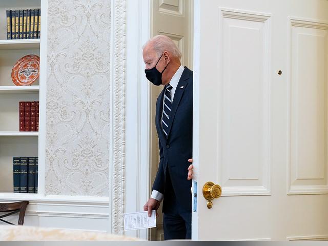 President Joe Biden arriving to sign the American Rescue Plan, a coronavirus relief package, in the Oval Office of the White House, Thursday, March 11, 2021, in Washington. (AP Photo/Andrew Harnik)
