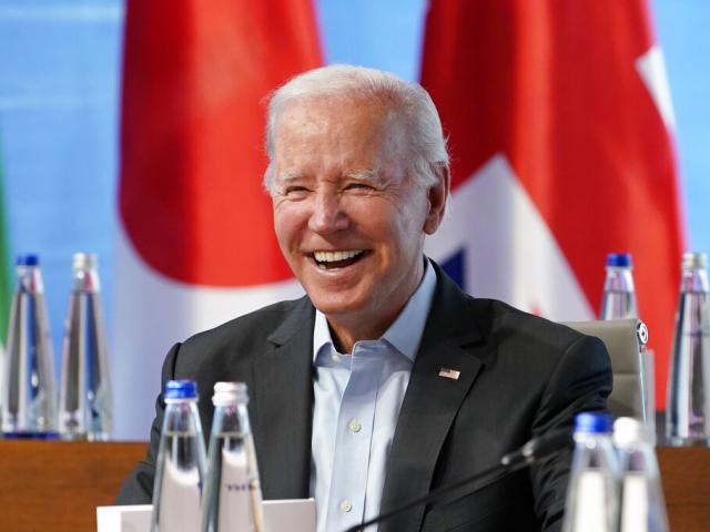 President Joe Biden laughs at the G7 Summit in Germany, June 27, 2022 (AP Photo/Susan Walsh, Pool)