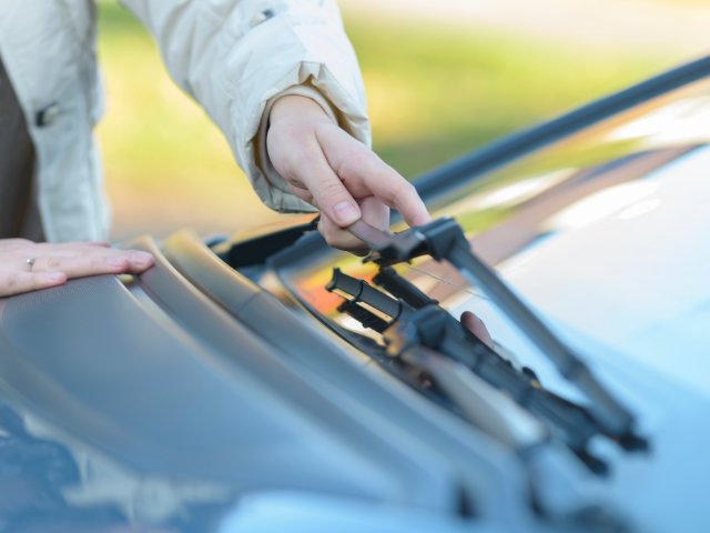 changing the blades on a windshield wiper