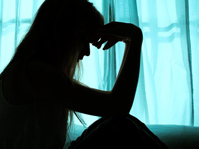 depression-silhouette-woman-window
