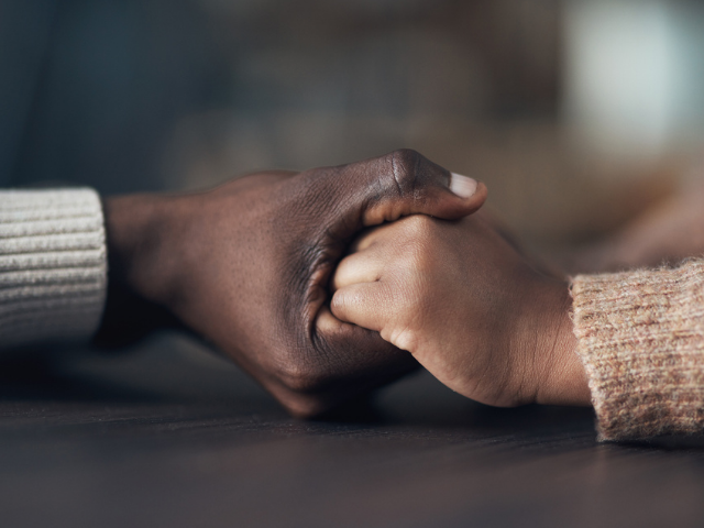 black and white hands holding hands