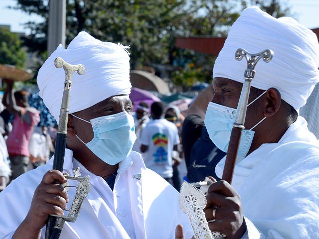 Ethiopians at the church in Addis Ababa, Ethiopia, during the Timket festival, Jan, 18, 2021, an Orthodox Christian occasion (AP Photo)