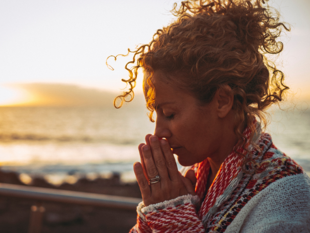 emotional woman praying