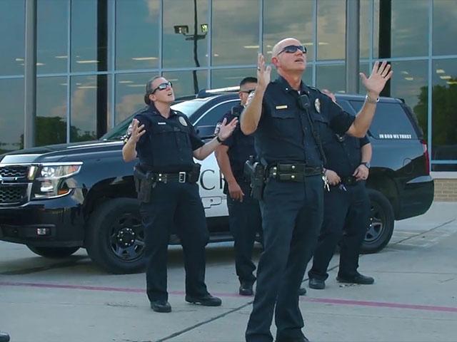 Officers of the Crandall, Texas Police Department appear in their lip-sync version of the popular Christian song &quot;God&#039;s Not Dead.&quot; Photo courtesy:  Crandall Police Department/Facebook