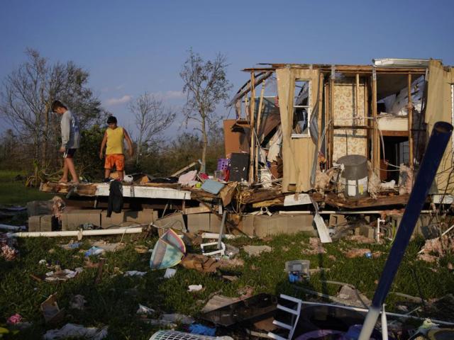 Remnants of a family&#039;s home destroyed by Hurricane Ida, Saturday, Sept. 4, 2021, in Dulac, La. (AP Photo/John Locher)