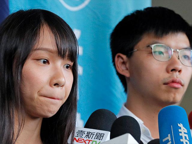 Pro-democracy activists Joshua Wong and Agnes Chow