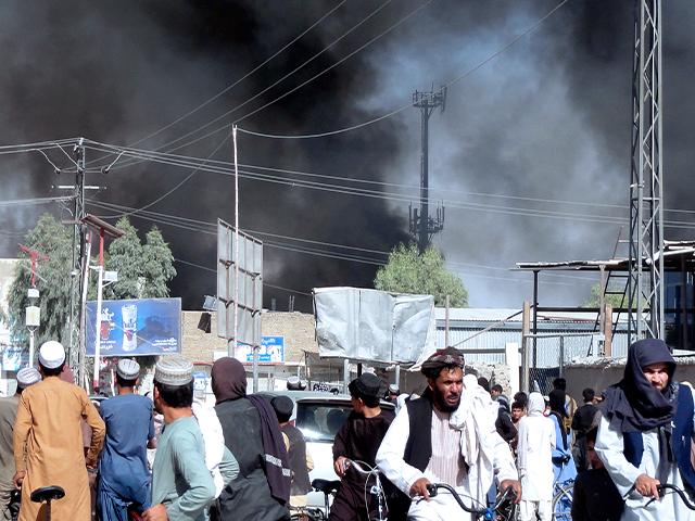 Smoke rises after fighting between the Taliban and Afghan security personnel in the city of Kandahar, southwest of Kabul, Afghanistan, Thursday, Aug. 12, 2021. (AP Photo/Sidiqullah Khan)