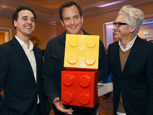 Will Arnett, center, host of the Fox television series &quot;Lego Masters,&quot; poses with executive producer/showrunner Andrew Dominici, right, and Fox president of alternative programming Rob Wade (AP Photo/Chris Pizzello)