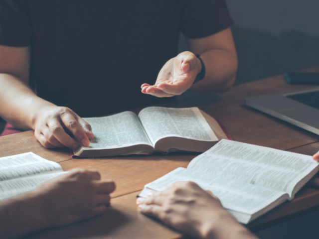 men studying the Bible