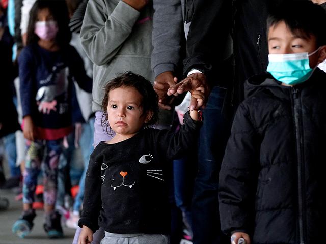 U.S. authorities encountered nearly double the number children traveling alone across the Mexican border in one day this week than on an average day last month, March 17, 2021, in Brownsville, Texas. (AP Photo/Julio Cortez)