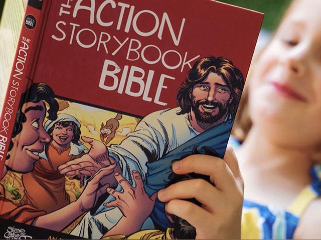Girl Reading Action Storybook Bible