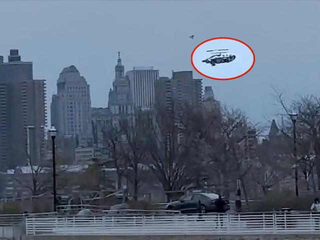 In this photo taken from video, a helicopter falls from the sky into the Hudson River , Thursday, April 10, 2025, in Jersey City, N.J. (Bruce Wall via AP)