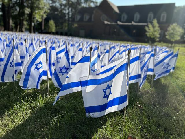 Regent University students placed Israeli flags on campus as a memorial for the lives lost during the events of October 7 one year ago. (Photo Courtesy: Regent University)