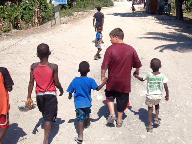 Boys walking in Haiti