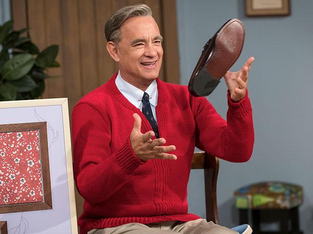 This image released by Sony Pictures shows Tom Hanks as Mister Rogers in a scene from "A Beautiful Day In the Neighborhood," in theaters on Nov. 22. (Lacey Terrell/Sony-Tristar Pictures via AP)