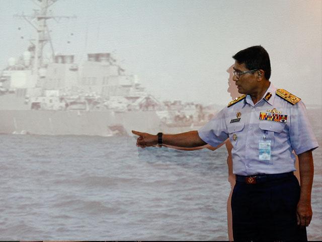 Malaysian Maritime Director Indera Abu Bakar points the damage of USS John S. McCain, Photo, AP, Daniel Chan