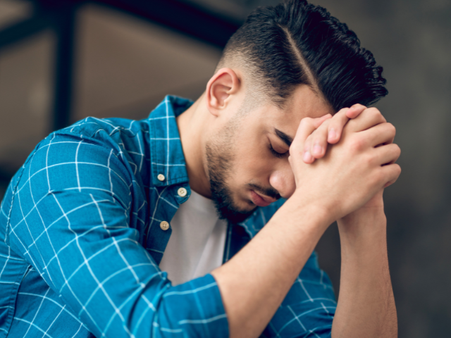 young-man-earnest-prayer