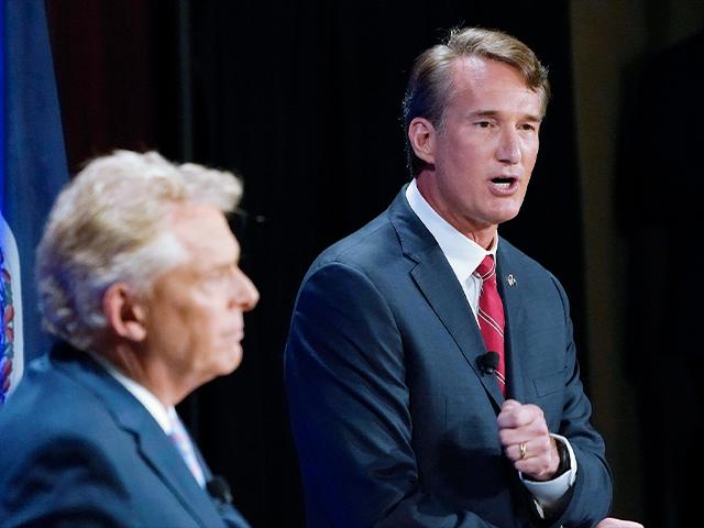 Republican Glenn Youngkin, right, debates Democratic candidate Terry McAuliffe in the Virginia governor&#039;s race (AP Photo/Steve Helber)