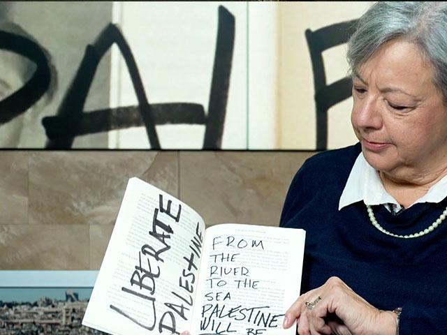 Melanie Sol reveals the antisemitic defacement of her book, &quot;Daughter of the Holocaust.&quot; Photo Credit: CBN News.