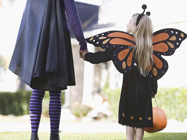 Mom and daugther in Halloween costumes