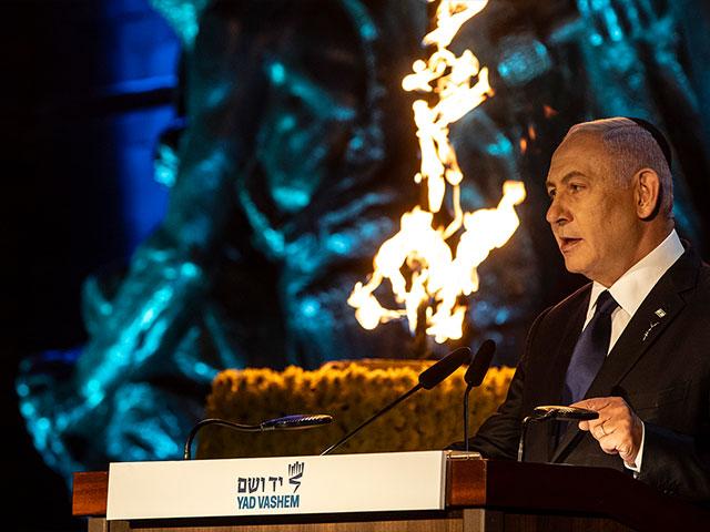 Israeli Prime Minister Benjamin Netanyahu delivers a speech during the opening ceremony of the Holocaust Martyrs and Heroes Remembrance Day at Yad Vashem Holocaust Museum in Jerusalem, on Wednesday, April 7, 2021. (Heidi Levine/Pool Photo via AP)