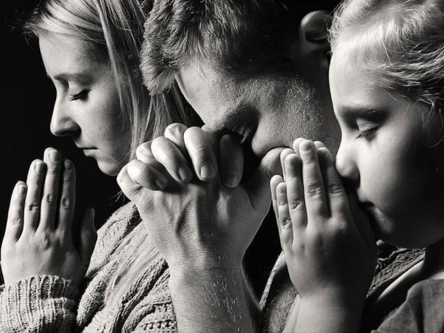 Praying family