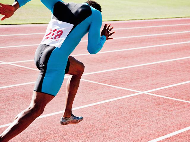 man running on a race track