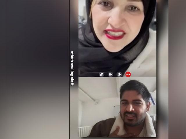 Israeli social media influencer Tal Oran speaking to Gazan woman. Photo Credit: Screenshot, @TheTravelingClatt, Youtube.