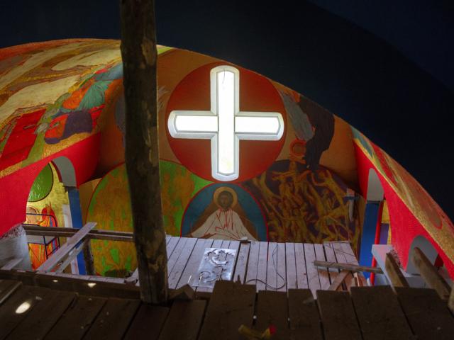 Christian Orthodox murals of the under construction new Church of the Intercession of the Blessed Virgin Mary in, Lypivka, near Lviv, Ukraine, April 30, 2024.  Two years ago it also provided physical refuge from horrors outside. (AP Photo/Francis Seco)