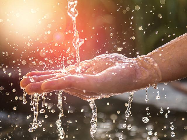 water pouring into a hand