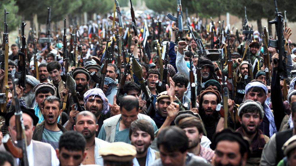 Afghan militiamen join Afghan defense and security forces during a gathering in Kabul, Afghanistan, June 23, 2021, as Pentagon wraps up U.S. military withdrawal. (AP Photo/Rahmat Gul)